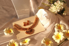 Nitya Jewels Graceful Gold-Plated Pink and Green studded chokar Jewelry Set  Antique Necklace Set with Earrings For Women
