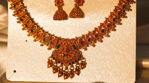 Nitya Jewels Graceful Gold-Plated Pink and Green studded chokar Jewelry Set  Antique Necklace Set with Earrings For Women
